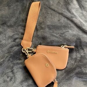 Lululemon dual pouch wristlet in cactus leather. Never used